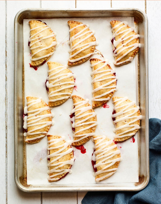 Sweet Cherry Wood Hand Pies with Lemon Icing