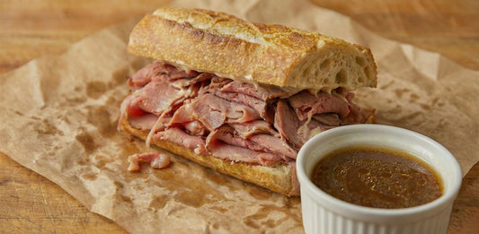 Quick-Dipped Shaved Prime Rib Sandwiches on Toasted Baguette